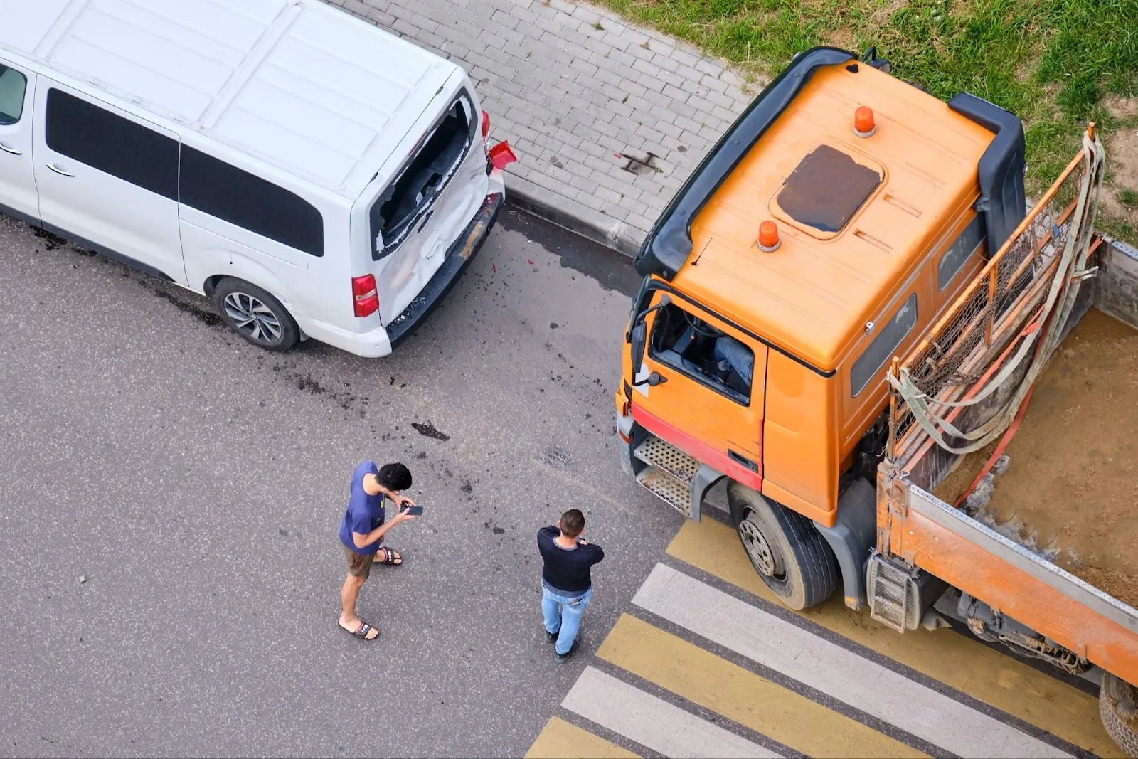 A collision between a truck and a car