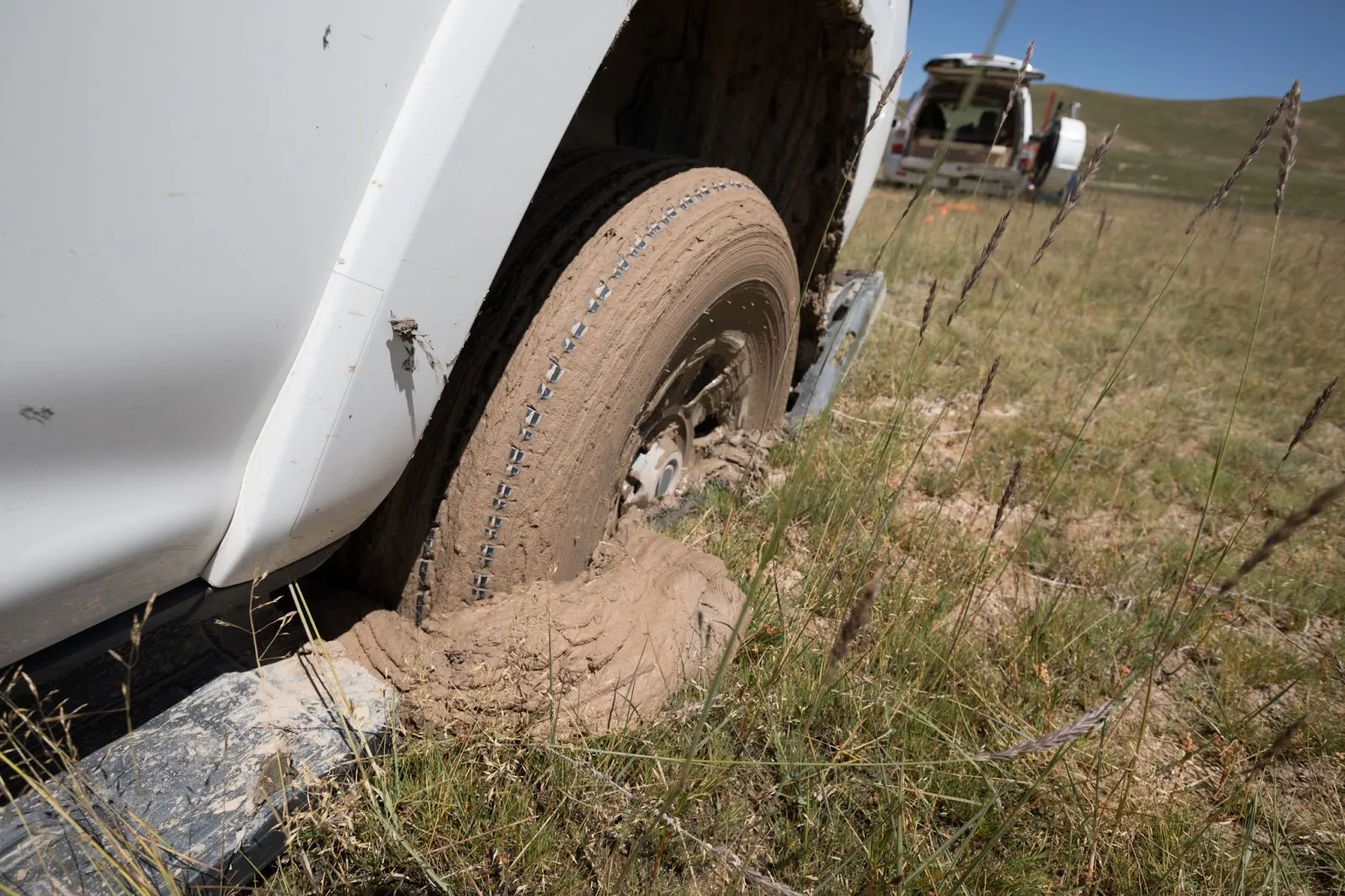 A car wheel stuck in the mud