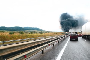 A car on fire on the highway